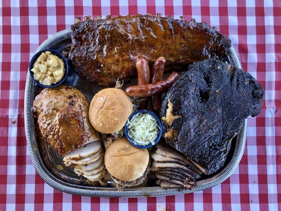 The Salt Lick food truck offers chopped beef and pulled pork sandwiches, sausage wraps, brisket, ribs and sides. (Courtesy Salt Lick BBQ)