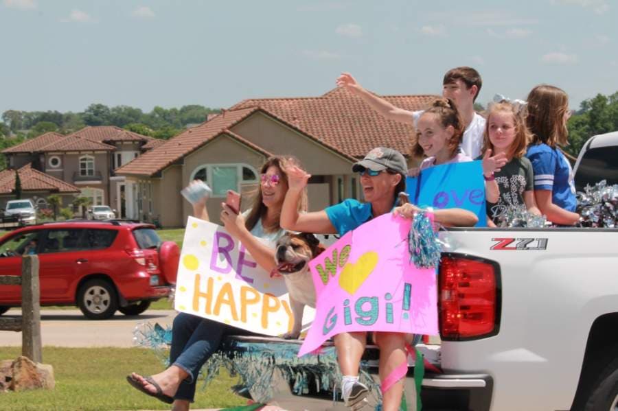 Organized by the Montgomery Area Chamber of Commerce, Montgomery residents drove in front of Live Oak Senior Care May 7 to lift the spirits of its residents and staff. (Andy Li/Community Impact Newspaper)