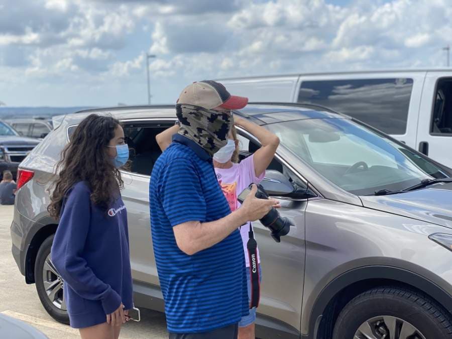 Spectators wait to get a view of the flyover. (Brian Rash/Community Impact Newspaper)