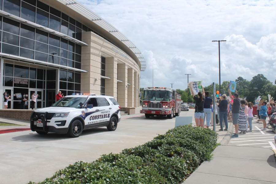 Local firefighters and police officers joined in at each campus. (Colleen Ferguson/Community Impact Newspaper)