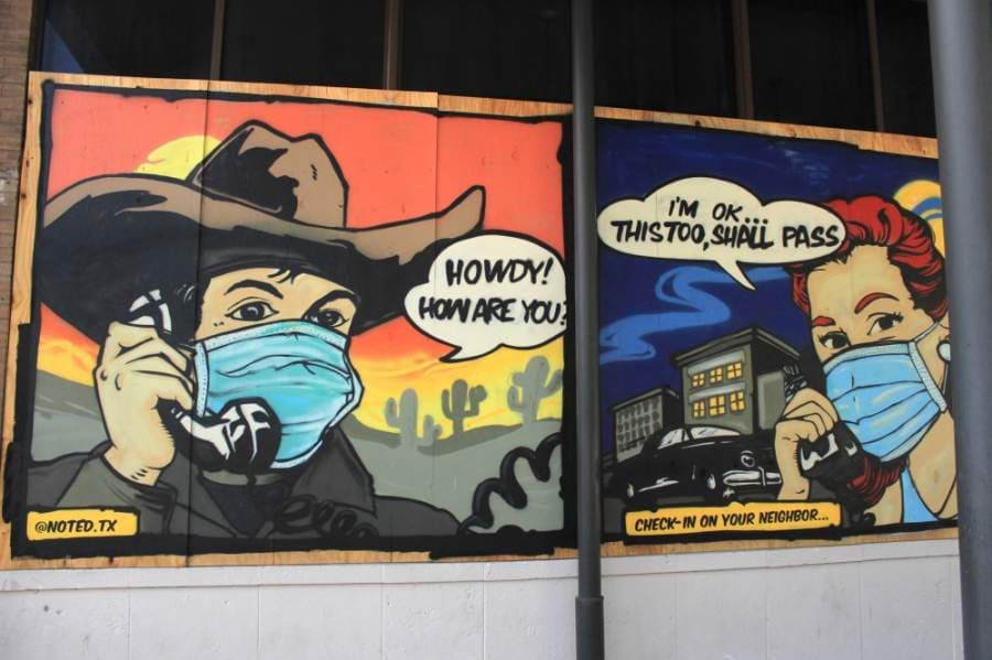 Many bars on Sixth Street remain boarded up, and some were painted by artists from the HOPE Outdoor Gallery. On May 18, Gov. Greg Abbott announced that bars could reopen on May 22. (Jack Flagler/Community Impact Newspaper)