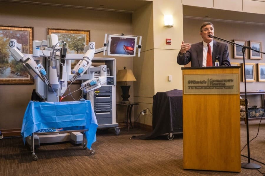 Hugh Brown, CEO of St. David’s Georgetown Hospital, speaks at a Feb. 20 ribbon-cutting event celebrating the new robot. (Courtesy St. David's HealthCare)