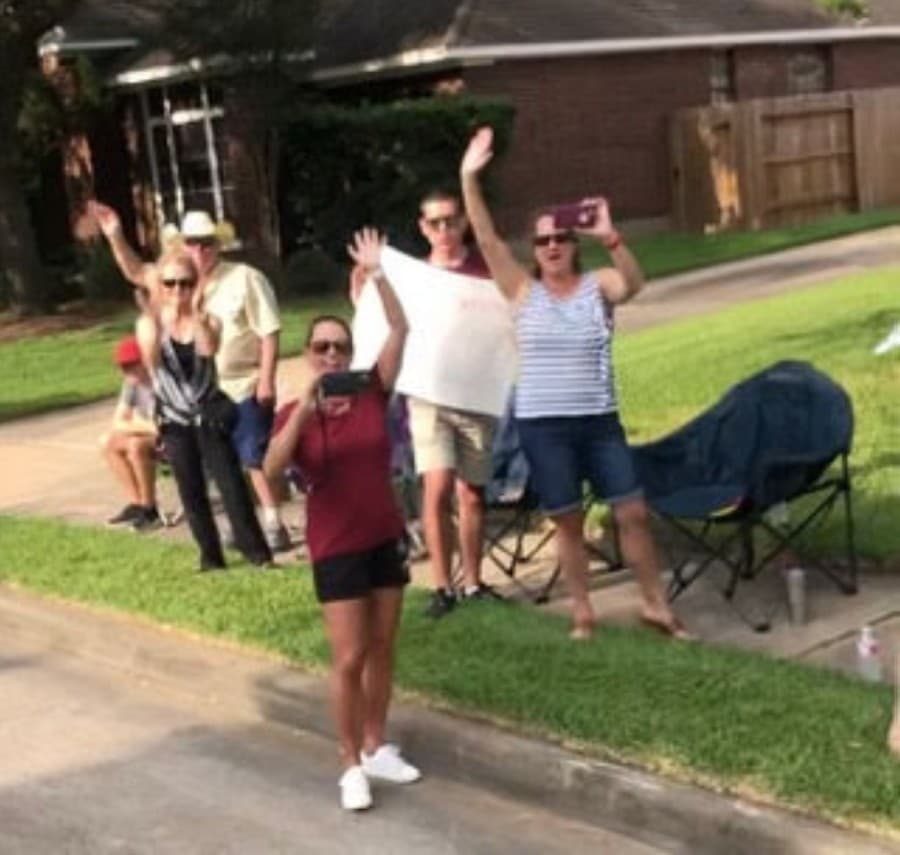 Community members waved and clapped to the parade of Cinco Ranch High School seniors who attended Fielder Elementary on May 21. (Courtesy Janie Dale)