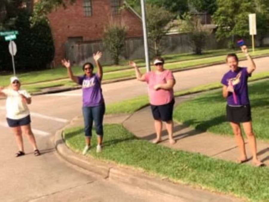 Community members waved and clapped to the parade of Cinco Ranch High School seniors who attended Fielder Elementary on May 21. (Courtesy Janie Dale)