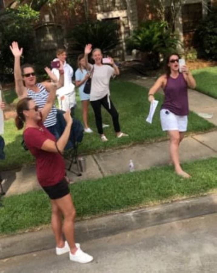 Community members waved and clapped to the parade of Cinco Ranch High School seniors who attended Fielder Elementary on May 21. (Courtesy Janie Dale)