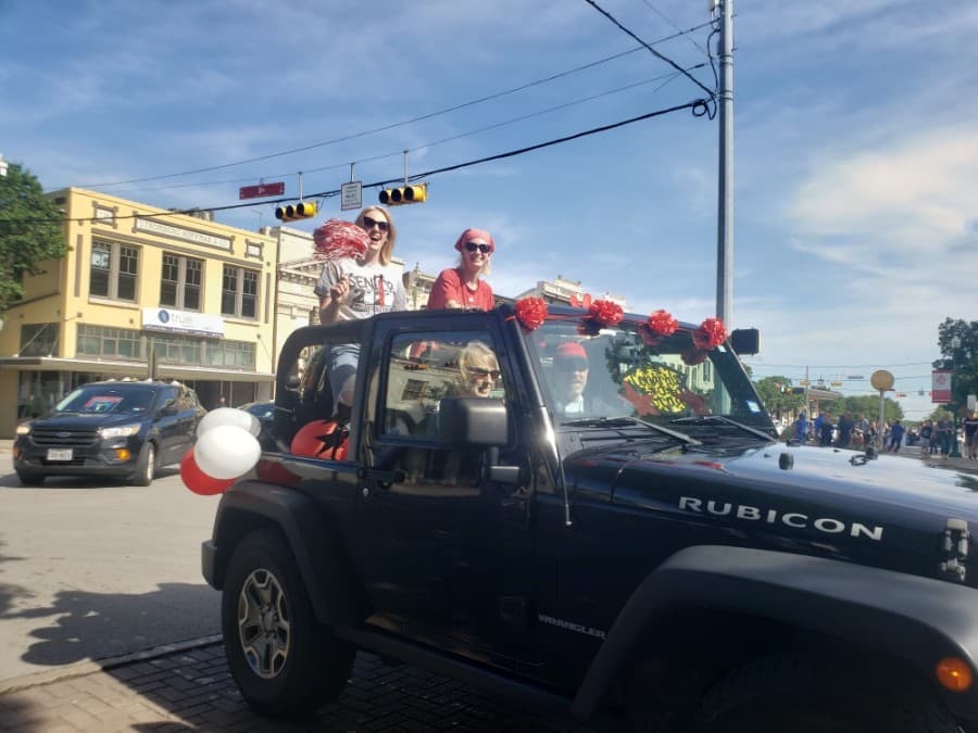 The Georgetown ISD seniors' parade May 29 passed through the Georgetown Square. (Ali Linan/Community Impact Newspaper)