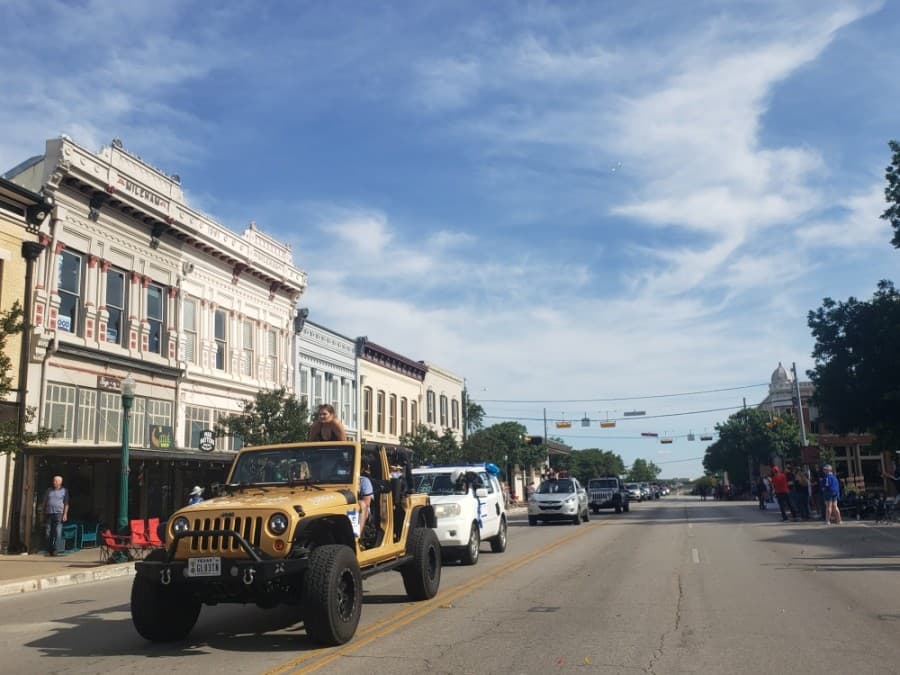 The Georgetown ISD seniors' parade May 29 passed through the Georgetown Square. (Ali Linan/Community Impact Newspaper)