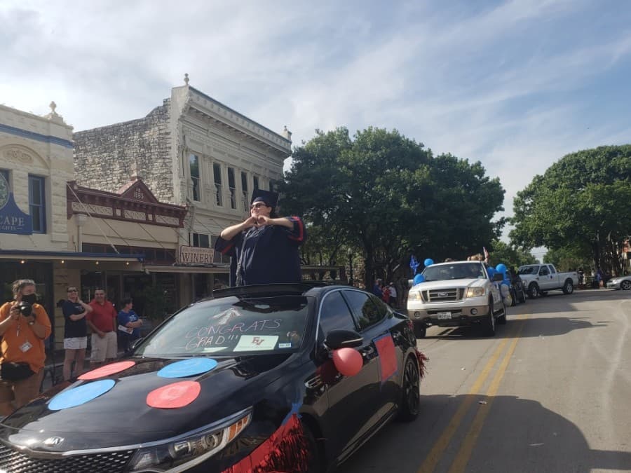 The Georgetown ISD seniors' parade May 29 passed through the Georgetown Square. (Ali Linan/Community Impact Newspaper)