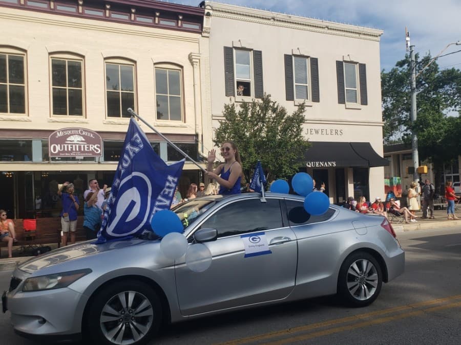 The Georgetown ISD seniors' parade May 29 passed through the Georgetown Square. (Ali Linan/Community Impact Newspaper)