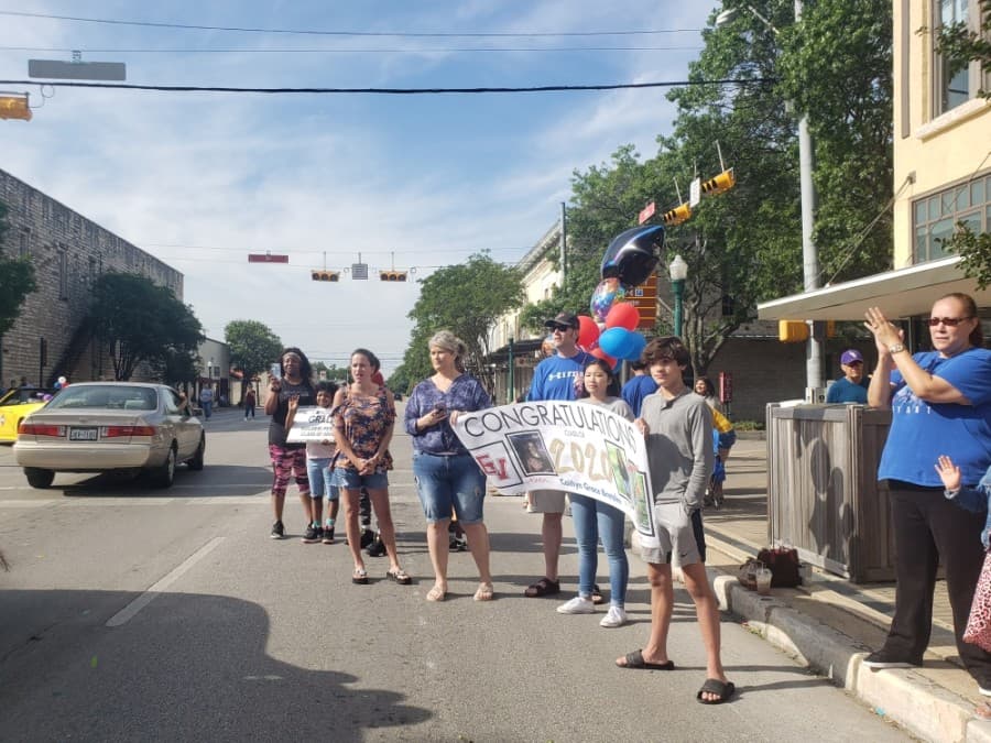 Many spectators cheered on the Georgetown ISD seniors at the May 29 parade.  (Ali Linan/Community Impact Newspaper)