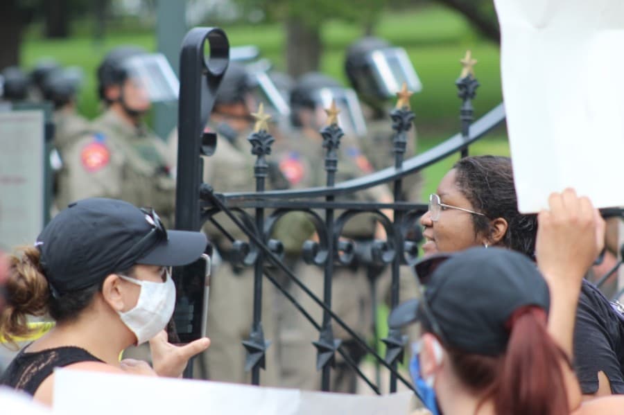 Protesters and Texas Rangers stood face-to-face during demonstrations at the Texas Capitol on May 31. (Christopher Neely/Community Impact Newspaper)