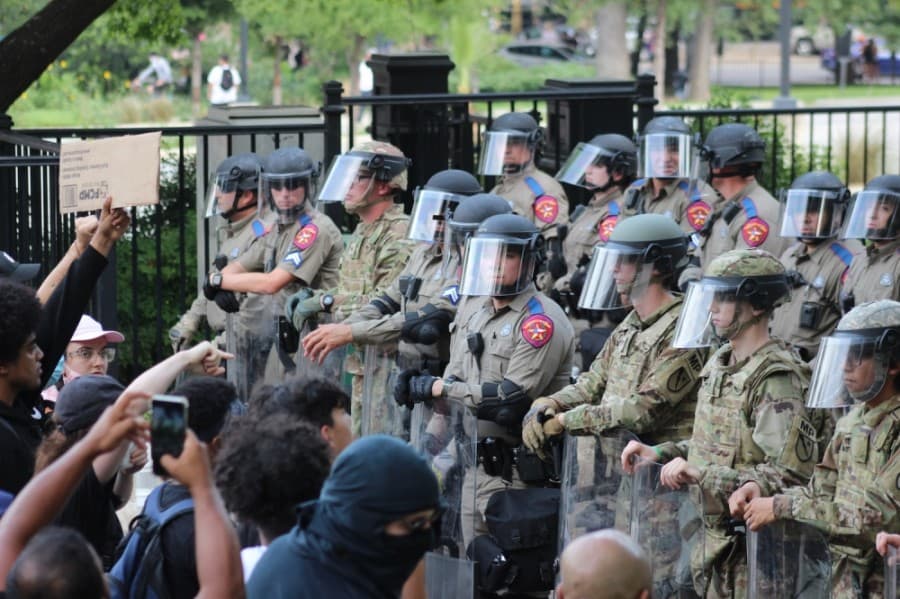 Protesters and Texas Rangers stood face-to-face during demonstrations at the Texas Capitol and in front of the governor's mansion on May 31. (Christopher Neely/Community Impact Newspaper)