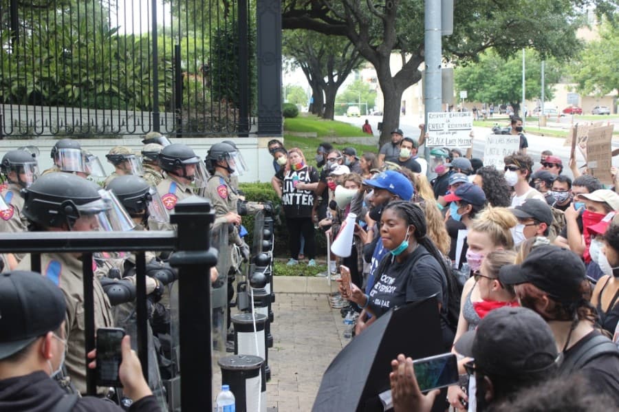 Protesters and Texas Rangers stood face-to-face during demonstrations at the Texas Capitol and in front of the governor's mansion on May 31. (Christopher Neely/Community Impact Newspaper)