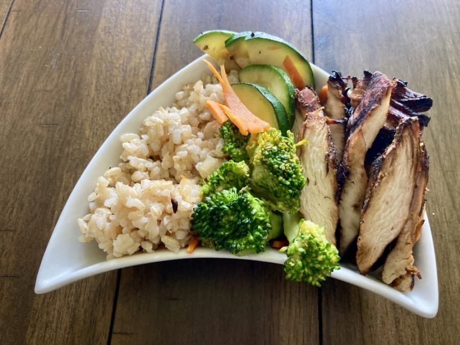 The Chicken Teriyaki Bowl is composed of rice, stir-fried vegetables and teriyaki chicken. (Taylor Jackson Buchanan/Community Impact Newspaper)