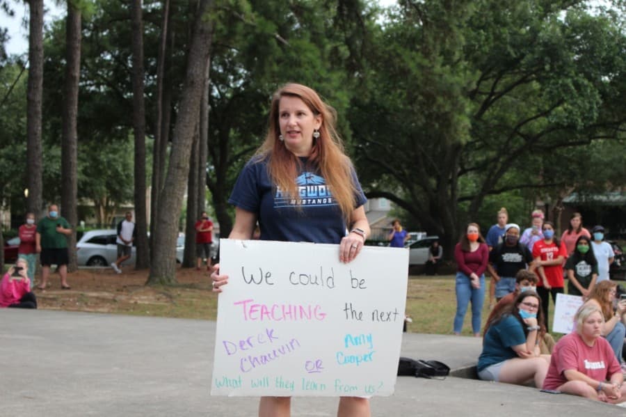 Cindy Welch, a co-organizer of the event and Kingwood High School teacher, addressed the crowd on June 1. (Kelly Schafler/Community Impact Newspaper)