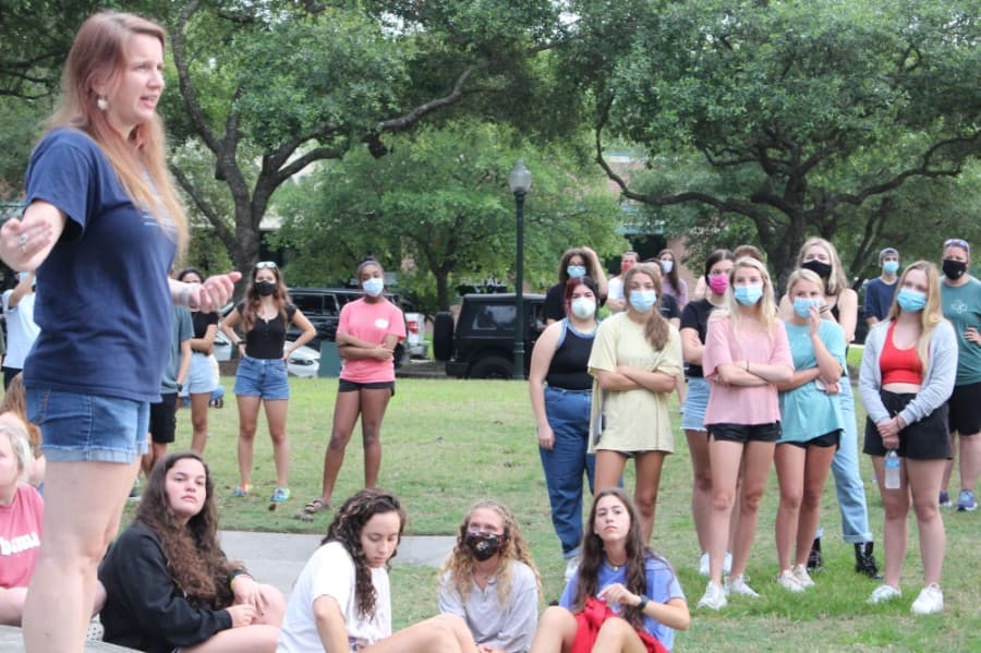 Cindy Welch (left), a co-organizer of the event and Kingwood High School teacher, addresses the crowd June 1. (Kelly Schafler/Community Impact Newspaper)