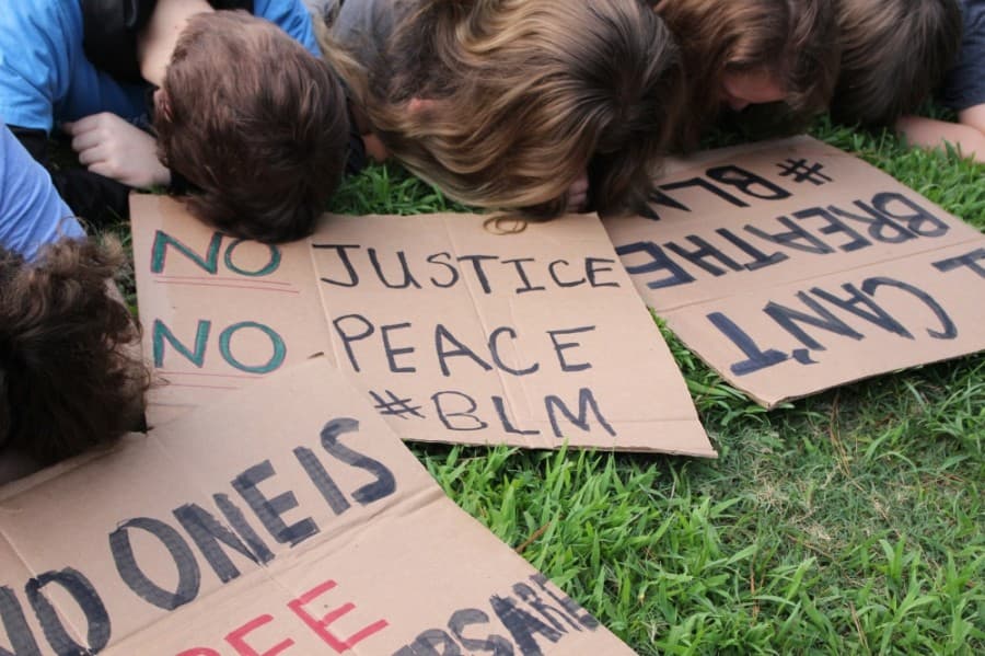 PHOTOS: Protesters gather in Kingwood Town Center Park to honor George Floyd