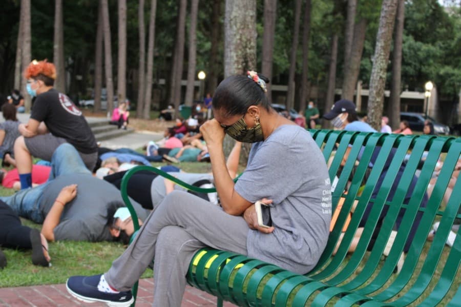 More than 200 people gather at Kingwood Town Center Park on June 1 to peacefully protest the death of George Floyd. (Kelly Schafler/Community Impact Newspaper)
