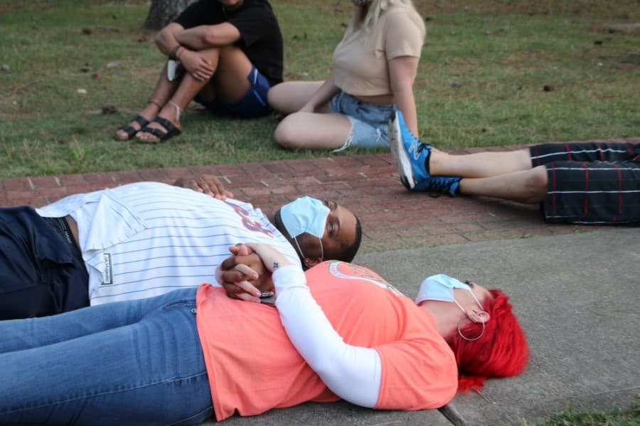 More than 200 people gather at Kingwood Town Center Park on June 1 to peacefully protest the death of George Floyd. (Kelly Schafler/Community Impact Newspaper)