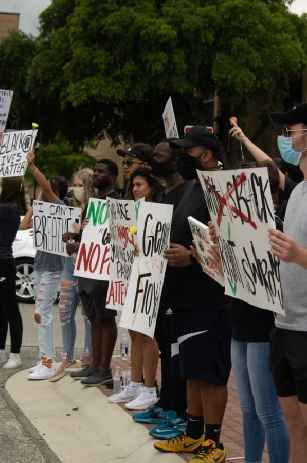 Protesters in downtown New Braunfels made their voices heard on the subject of George Floyd's death. (Warren Brown/Community Impact Newspaper)