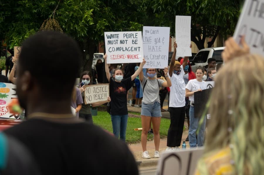 Protesters in downtown New Braunfels made their voices heard on the subject of George Floyd's death. (Warren Brown/Community Impact Newspaper)