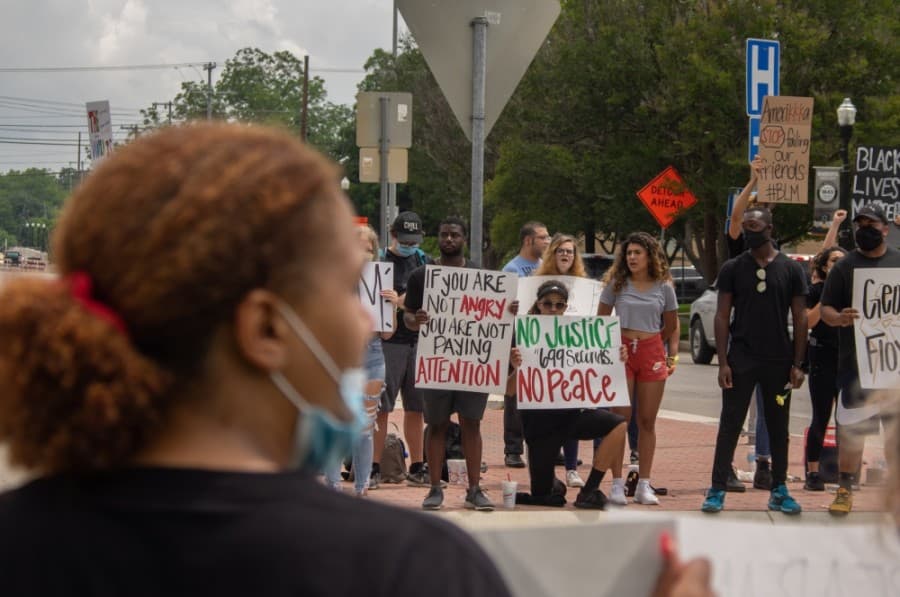 Protesters in downtown New Braunfels made their voices heard on the subject of George Floyd's death. (Warren Brown/Community Impact Newspaper)