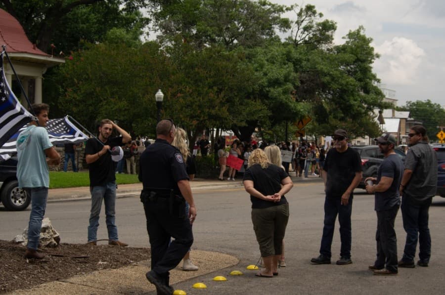 Protesters in downtown New Braunfels made their voices heard on the subject of George Floyd's death. (Warren Brown/Community Impact Newspaper)