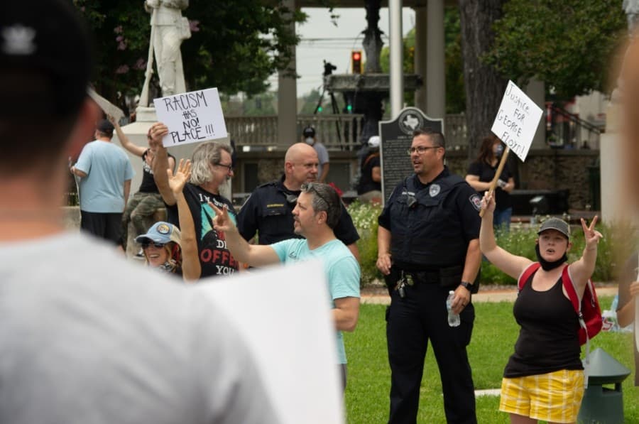 Protesters in downtown New Braunfels made their voices heard on the subject of George Floyd's death. (Warren Brown/Community Impact Newspaper)