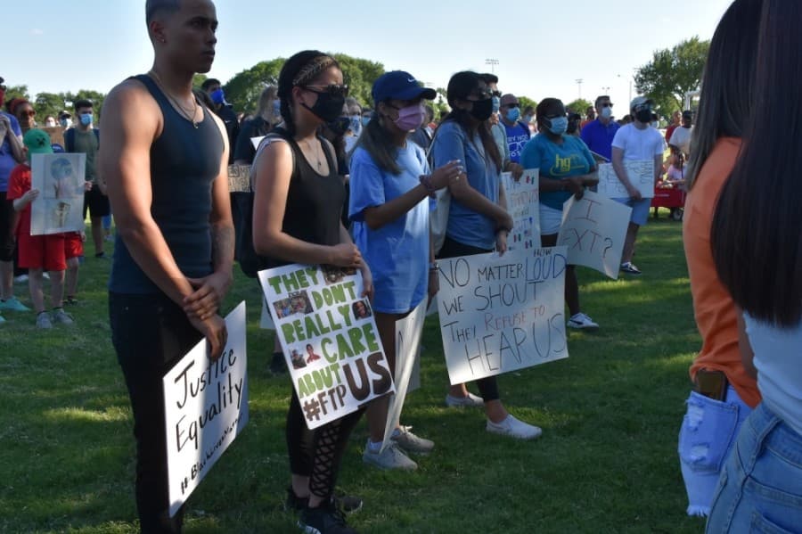 Some protesters wore masks, while other chose to go without. (Makenzie Plusnick/Community Impact Newspaper)