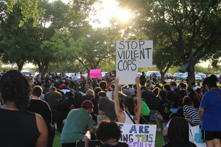 Demonstrators kneeled during the Katy for Black Lives Matter Protest held June 4 at Katy Park.  (Eva Vigh/Community Impact Newspaper)