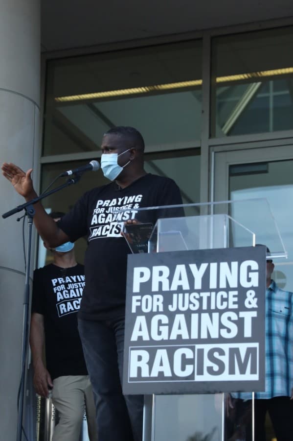 Dr. Conway Edwards, lead pastor of One Community Church, welcomed the crowd, saying, "Racism is not a skin issue. It is a sin issue." (Liesbeth Powers/Community Impact Newspaper)