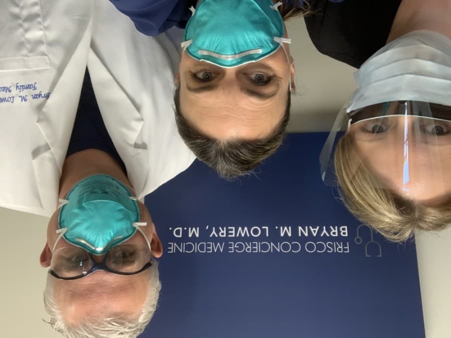 Dr. Bryan M. Lowery poses with nurses at Frisco Concierge Medicine. (Courtesy Frisco Concierge Medicine)