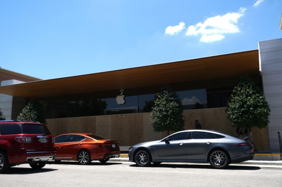 The windows in front of the Apple Store at Southlake Town Square were boarded up ahead of the protest. (Gavin Pugh/Community Impact Newspaper)
