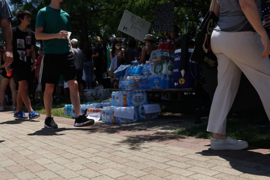 Free water was made available at the protest. (Gavin Pugh/Community Impact Newspaper)