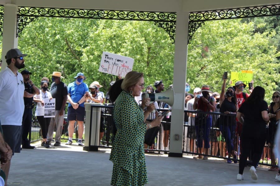 Southlake Mayor Laura Hill speaks at the pavilion at Southlake Town Square. (Ian Pribanic/Community Impact Newspaper)