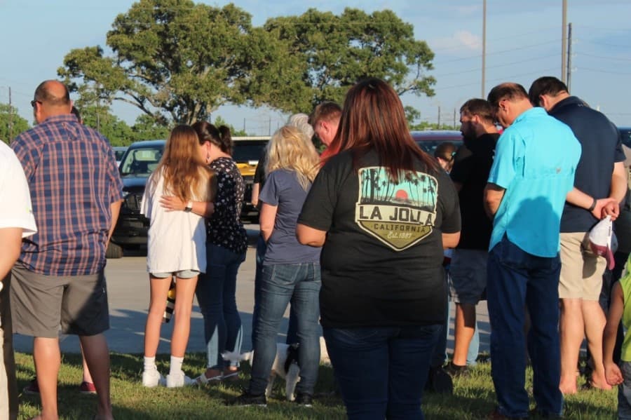 Members of the Magnolia community gathered to pray June 5 for unity amid unrest in the nation. (Anna Lotz/Community Impact Newspaper)