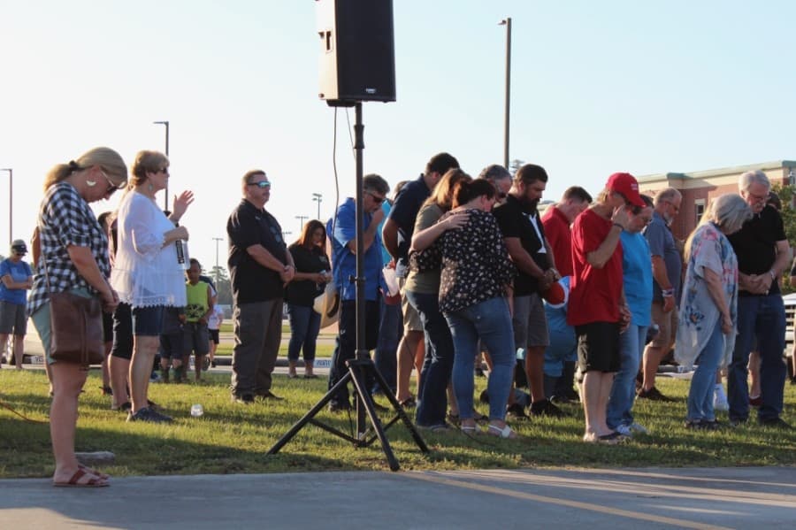 Members of the Magnolia community gathered to pray June 5 for unity amid unrest in the nation. (Anna Lotz/Community Impact Newspaper)