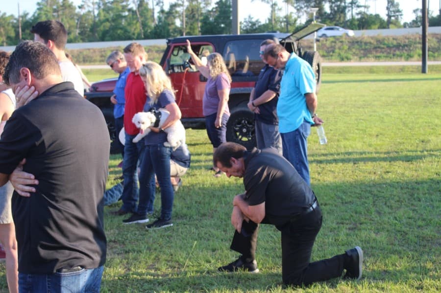 A few dozen community members attended the prayer rally, led by local pastors June 5. (Dylan Sherman/Community Impact Newspaper)