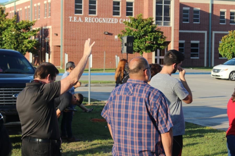 Members of the Magnolia community gathered to pray June 5 for unity amid unrest in the nation. (Dylan Sherman/Community Impact Newspaper)