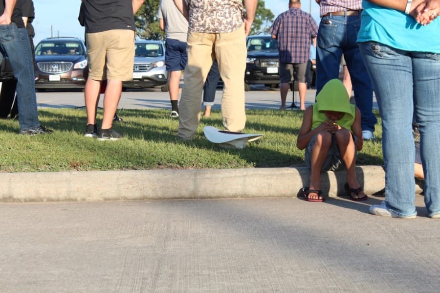 Community members of all ages came out to a prayer rally held in front of Magnolia High School on June 5. (Anna Lotz/Community Impact Newspaper)