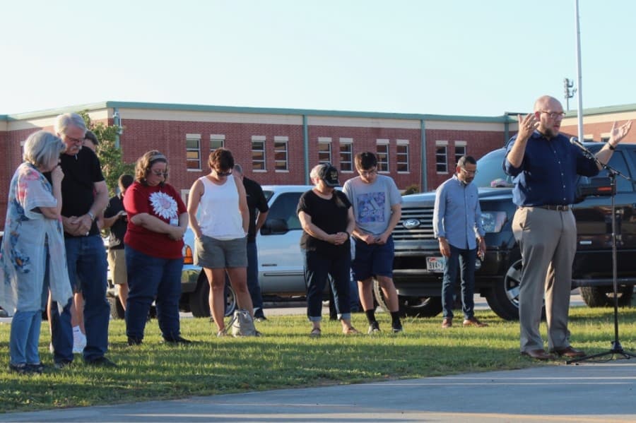 Andrew Hook, pastor of Magnolia United Methodist Church, was among those to lead attendees in prayer June 5. (Anna Lotz/Community Impact Newspaper)