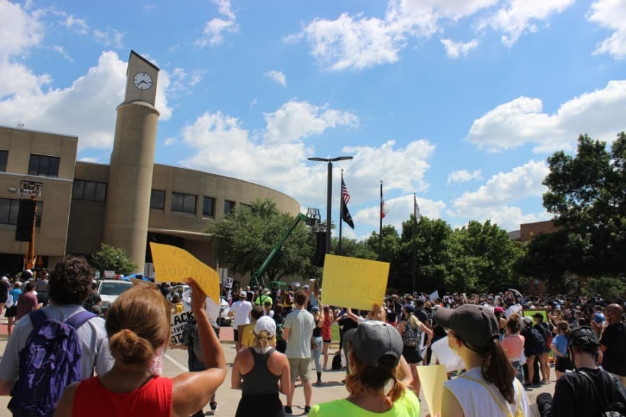 A large crowd gathers June 7 outside the Plano Municipal Center to protest prominent instances of police violence against black people. (Daniel Houston/Community Impact Newspaper)