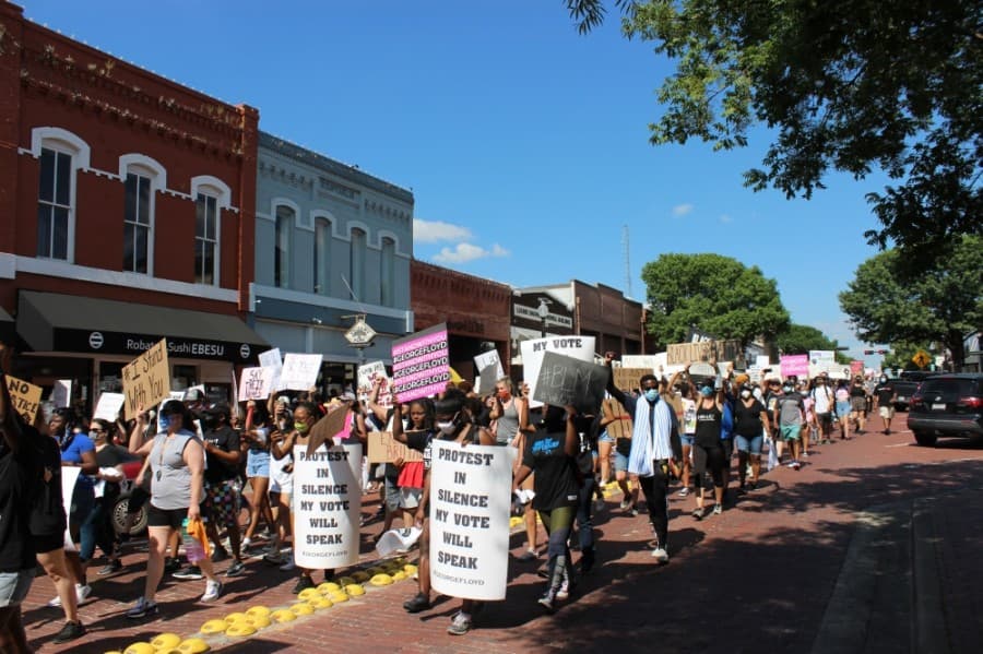 Peaceful protesters marched June 7 through the streets of downtown Plano to protest prominent instances across the country of police violence against black people. (Daniel Houston/Community Impact Newspaper)