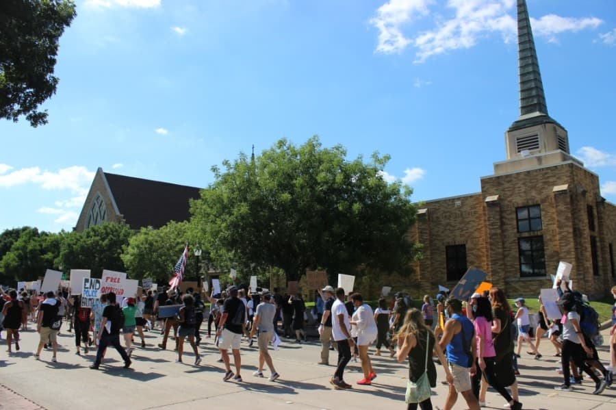 Peaceful protesters marched June 7 through the streets of downtown Plano to protest prominent instances across the country of police violence against black people. (Daniel Houston/Community Impact Newspaper)