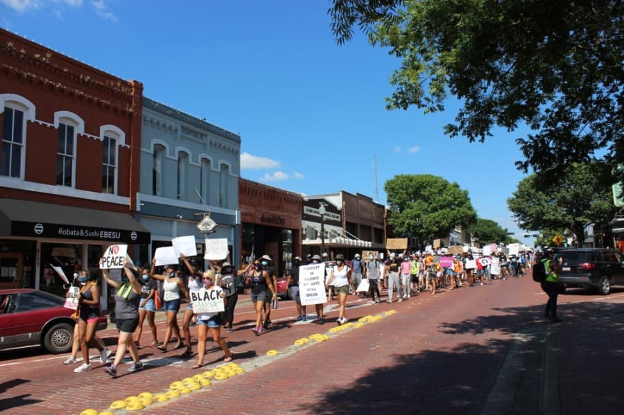 Peaceful protesters marched June 7 through the streets of downtown Plano to protest prominent instances across the country of police violence against black people. (Daniel Houston/Community Impact Newspaper)