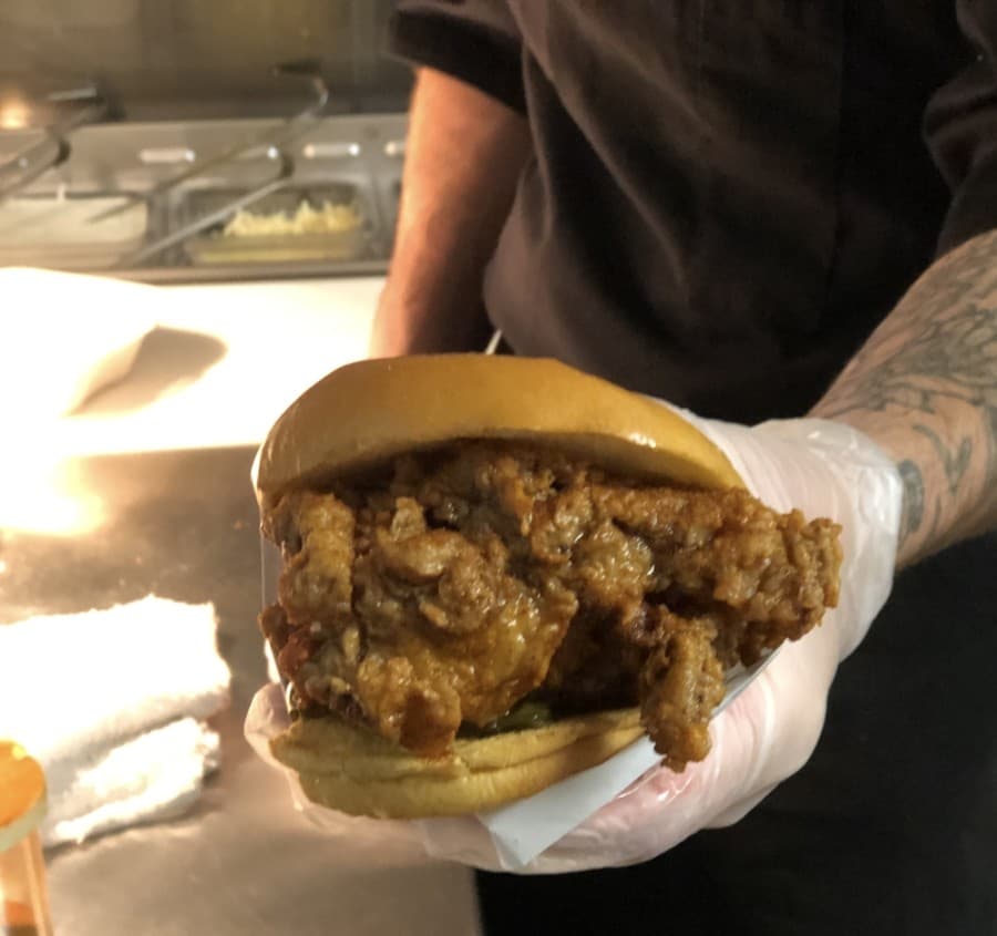 Chicken sandwich spot Hawt Chicken is one of the restaurants now open at Kitchen United Mix. (Jack Flagler/Community Impact Newspaper) 