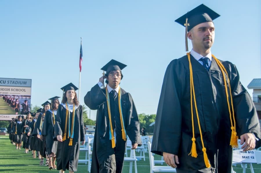 Students from the inaugural graduation class of Cypress Park High School, which opened in 2016, file in for a graduation ceremony June 6. (Courtesy Cy-Fair ISD)