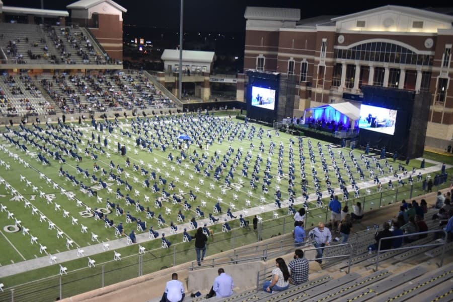 Cypress Ridge High School students wait in their seats, spaced six feet apart, at a June 4 graduation ceremony. (Courtesy Cy-Fair ISD)
