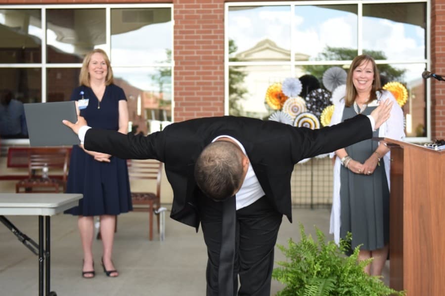A graduate from the Dorothy Carlton Center, which serves students with special needs, takes a bow at a June 3 ceremony. (Courtesy Cy-Fair ISD)