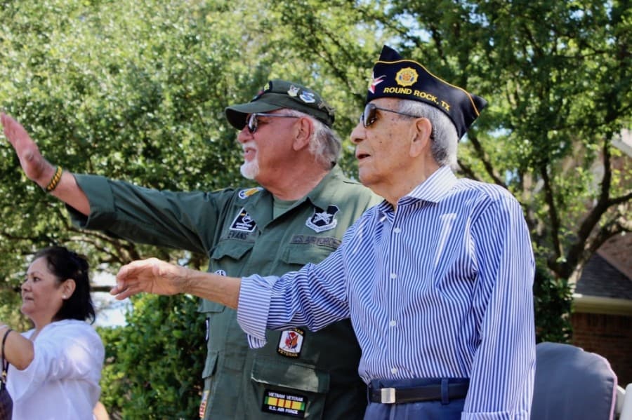 Dennis Evans (center) organized the event. 